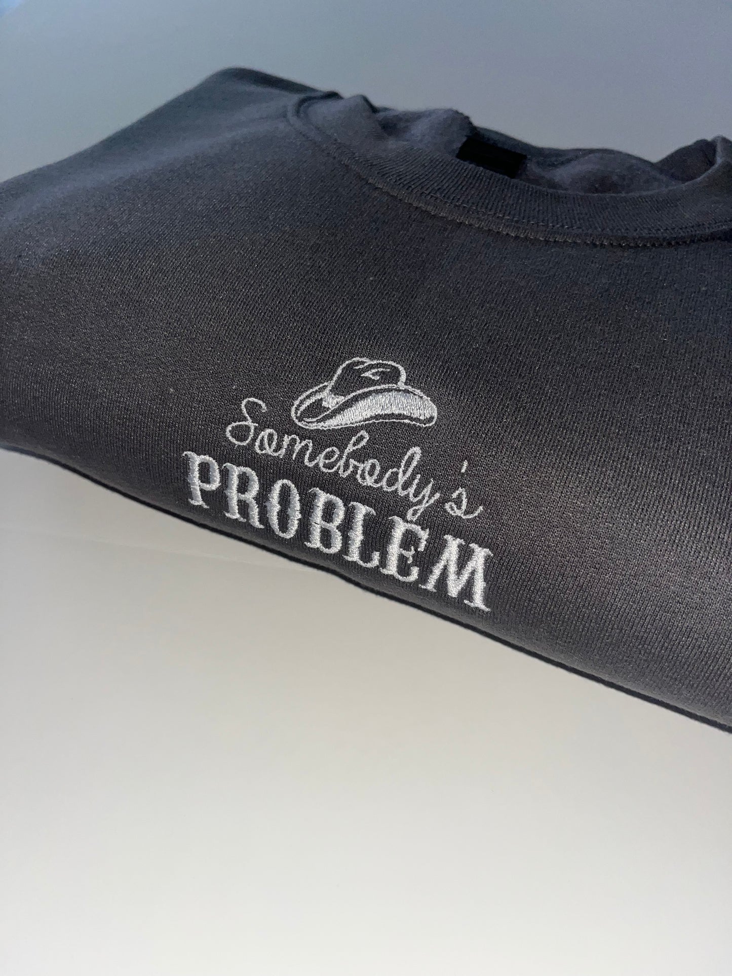 Somebody’s Problem” Crewneck